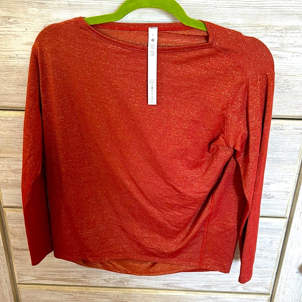 Lululemon orange tunic with sparkles- size 0 never worn!!